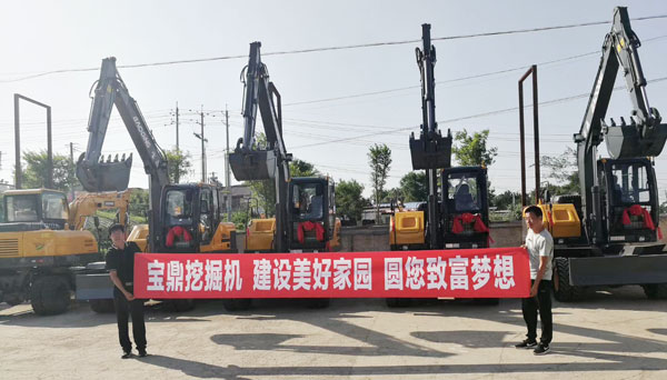 寶鼎輪式挖掘機抓木機致富貴州.jpg